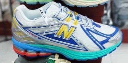 کفش کتانی وارداتی نیو بالانس New Balance 1906R (آبی سفید نقره ای)