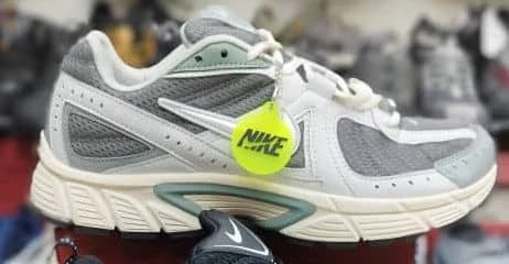 کفش کتانی وارداتی نایک دانک لو مردانه Nike Dunk Low طرح باندانا (کرم روشن طرحدار)
