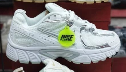 کفش کتانی وارداتی نایک Nike P-7000 (مشکی سفید)